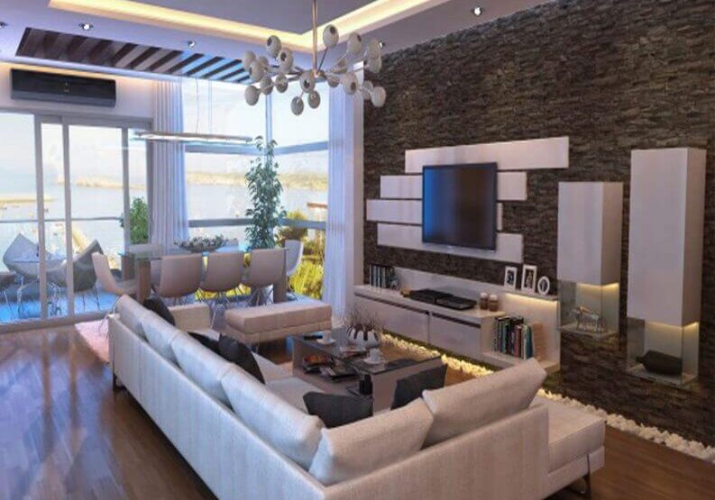 Modern living room with floor-to-ceiling windows and waterfront view